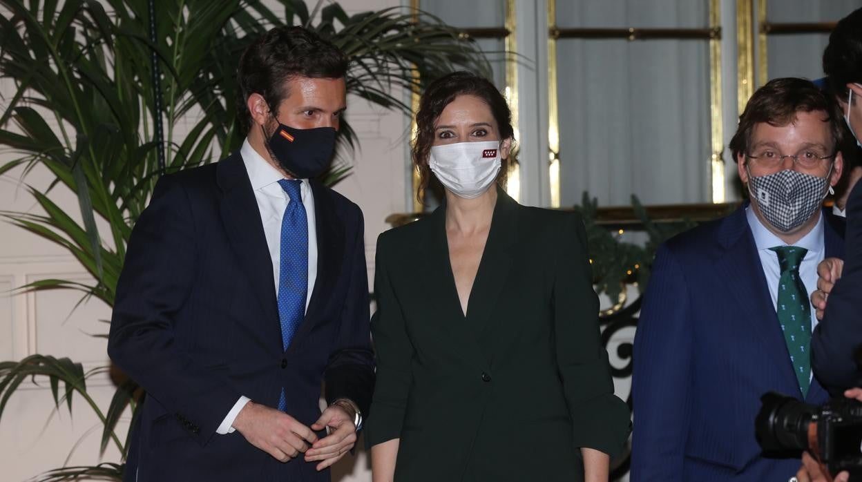 Rajoy consigue el reencuentro de Casado y Ayuso en un ambiente distante ...