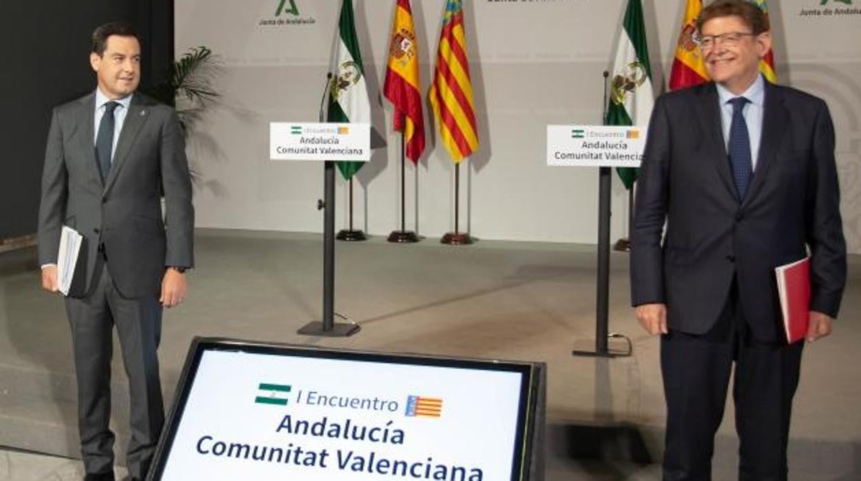 Los presidentes autonómicos andaluz y valenciano, Juan Manuel Moreno Bonilla y Ximo Puig, respectivamente, en un encuentro reciente