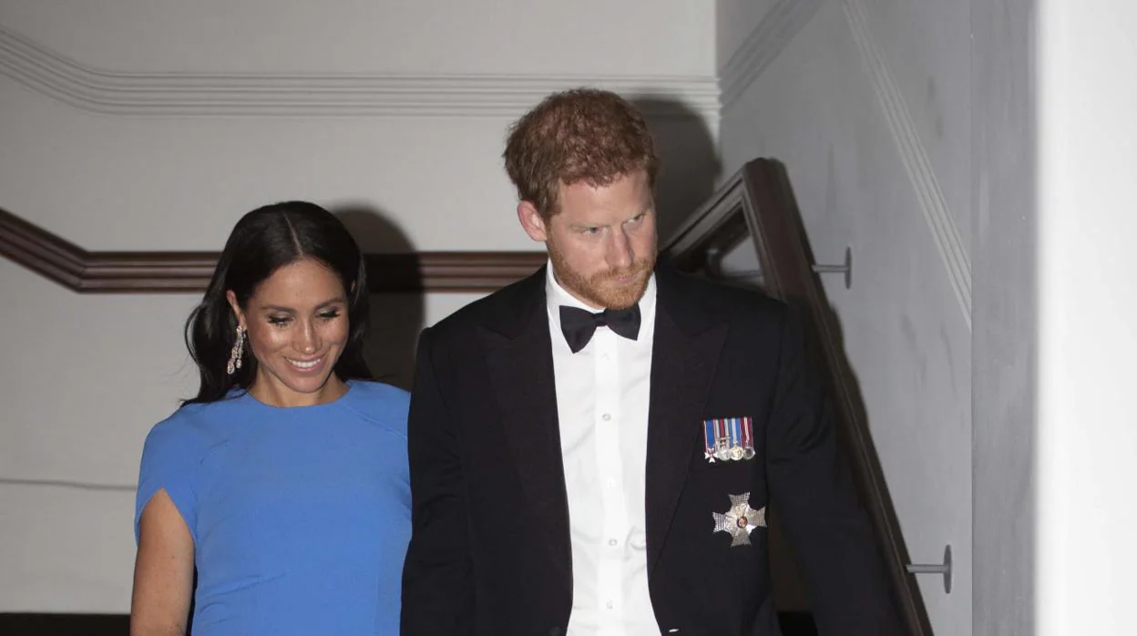 Meghan Markle y el Príncipe Harry, durante la cena de gala en Australia