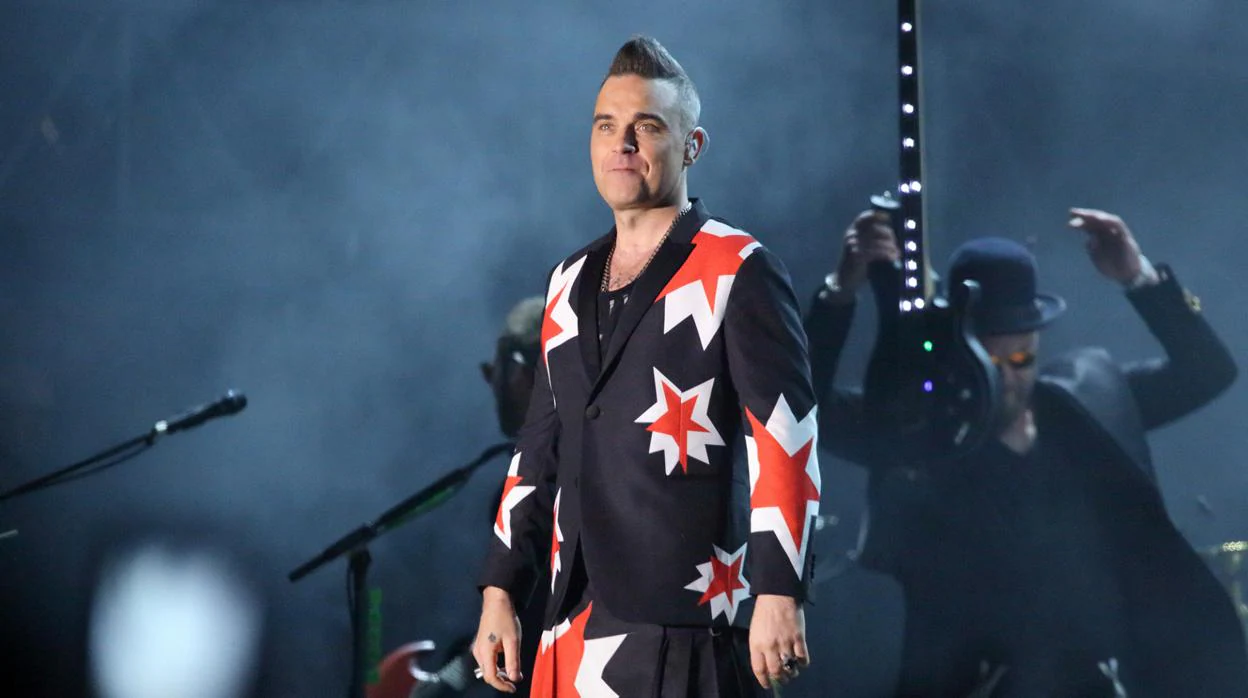 Robbie Williams durante uno de sus conciertos