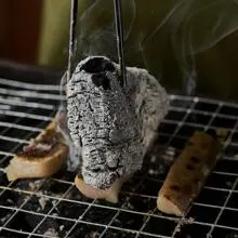 Trucha hecha en carbón de encina