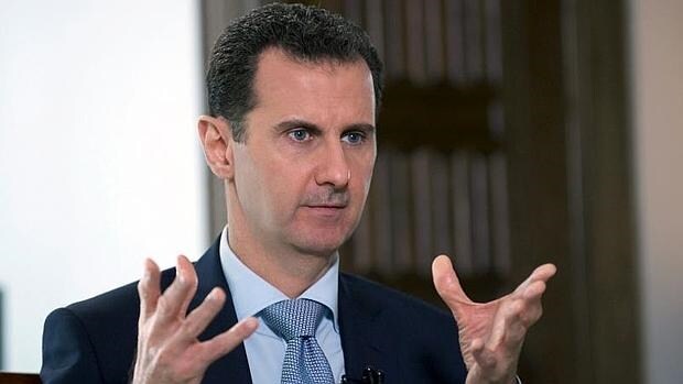 Fotografía de Bashar al-Assad durante una entrevista con una agencia de información rusa