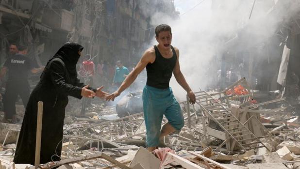 Imagen de archivo de un barrio de Alepo tras la caída de una bomba