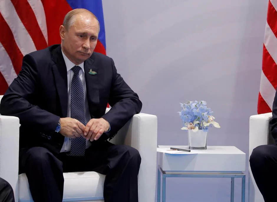 Putin y Trump en su encuentro durante una reunión del G20 hace un año