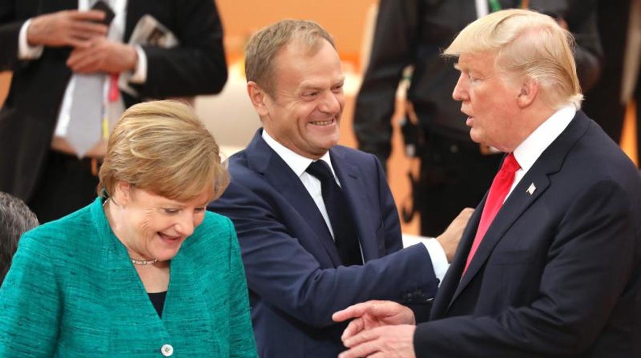 Angela Merkel, Donald Tusk y Donald Trump en una reunión del G20
