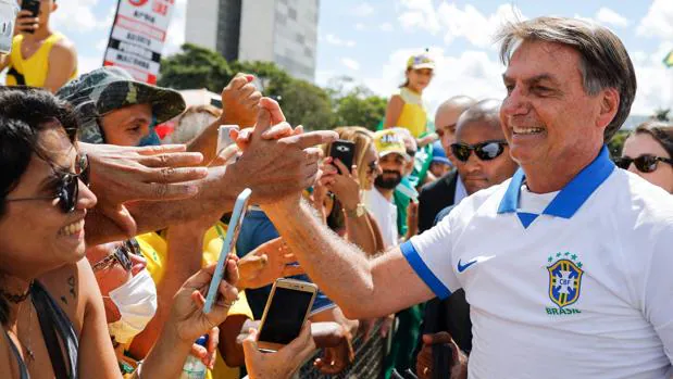 Baño de masas de Bolsonaro y López Obrador mientras el coronavirus se extiende por Latinoamérica