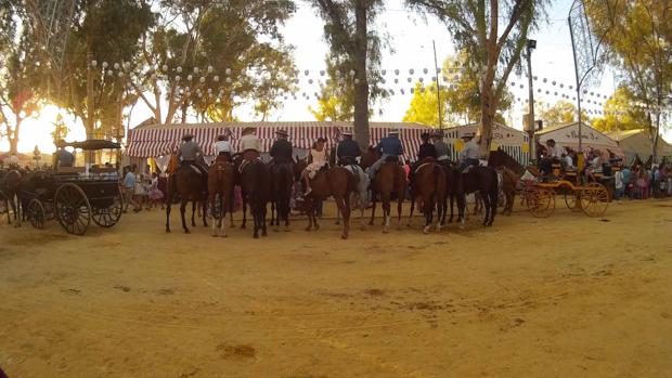 Caballistas en la feria de Utrera