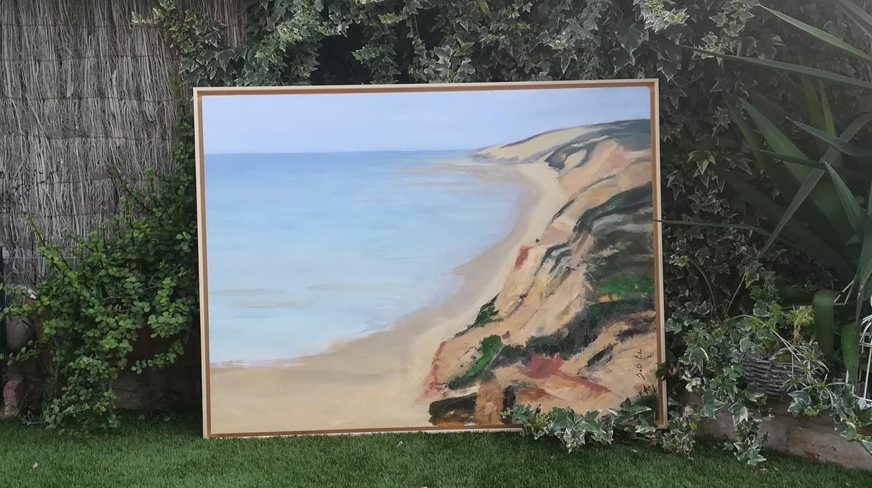 Uno de los cuadros de la exposición, que representa la Playa de Asperillo de Huelva