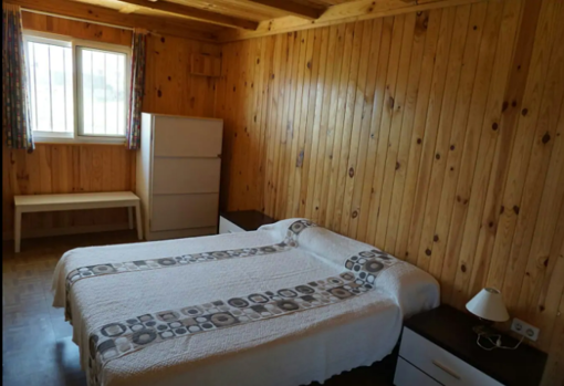 Dormitorio cabaña de madera en Conil