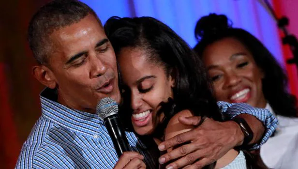 El presidente de EE.UU., Barack Obama, junto a su hija Malia