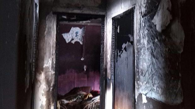 Un calentador, el origen del incendio que ha obligado a desalojar a dos personas en un piso de la Macarena