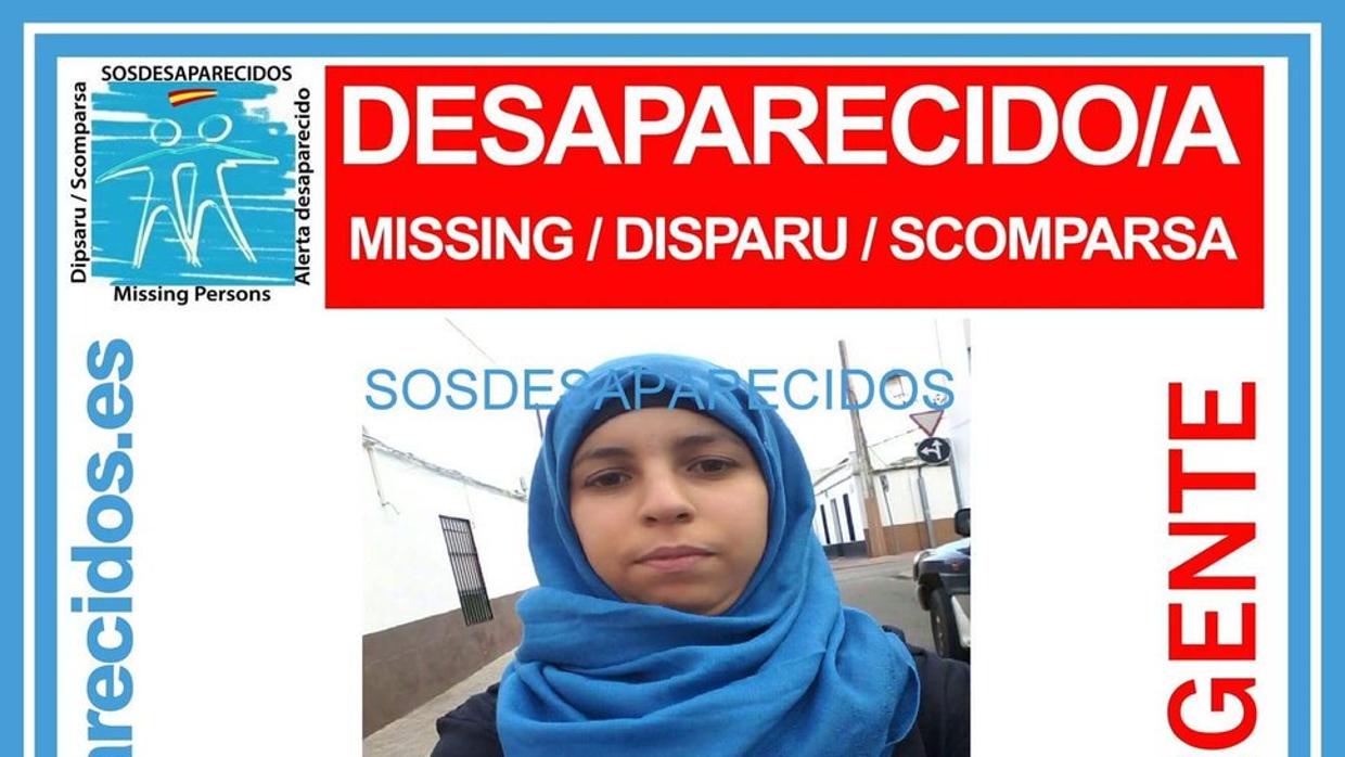 Cartel con la fotografía de la joven desaparecida