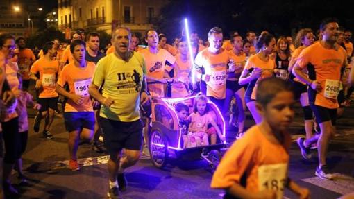 Participantes en la Carrera Nocturna del Guadalquivir