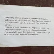 Cartel colgado en la puerta