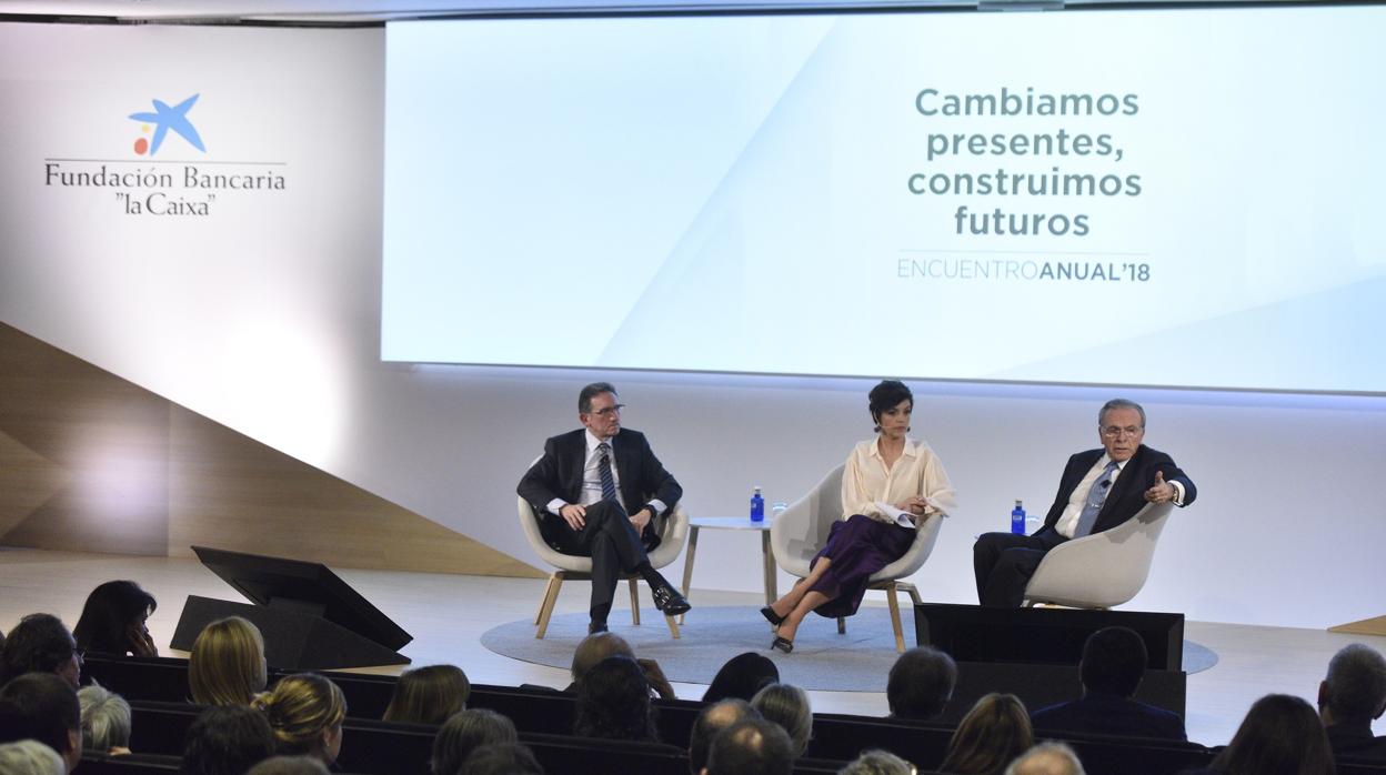 Isidro Fainé (izquierda), presidente de la Fundación Bancaria “la Caixa” con Jaume Giró, director general, durante la presentación a empleados de la nueva campaña