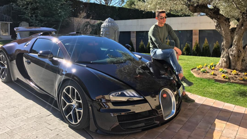 Cristiano con su Bugatti Veyron