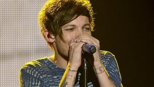 Louis Tomlinson, durante un concierto con One Direction